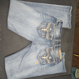 Rock Revival Light Blue Boot Cut Jeans with Embellished Pockets